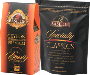 Basilur Ceylon Premium - czarna liściasta herbata cejlońska Orange Pekoe. Ozdobne, pomarańczowe pudełko z logo Basilur.