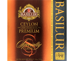 Basilur Ceylon Premium - czarna herbata cejlońska skomponowana z liści BOPF bez dodatków. Ozdobne opakowanie z pomarańczowymi elelmentami.