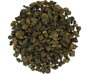 Basilur Stone Oolong Green Tea - zielona herbata oolong z dodatkiem aromatu mleka. Unikalna puszka w kształcie kamienia.