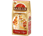 Basilur Merry Christmas - czarna herbata cejlońska z dodatkiem jabłka, krokoszu barwierskiego oraz aromatu imbiru i wanilii. Kremowe pudełko ze świątecznym motywem.