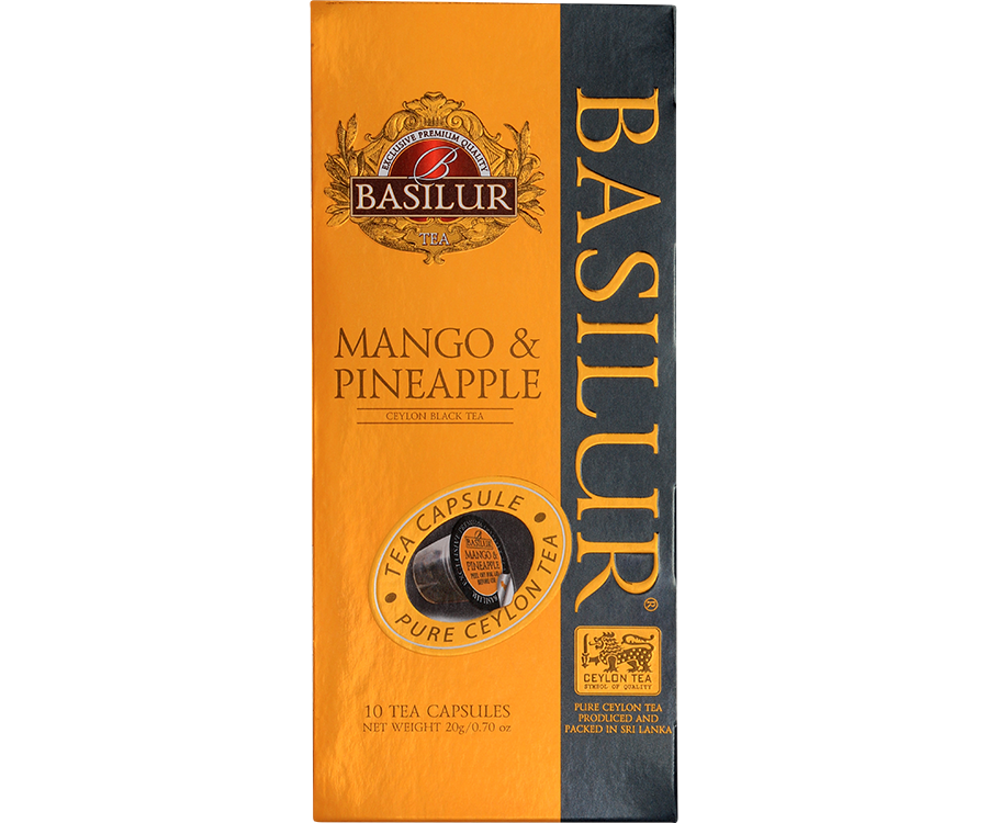 Basilur Mango & Pinapple - czarna herbata cejlońska z mango i ananasem w kapsułkach Nespresso, Ozdobne, żółte pudełko z logo Basilur.