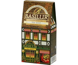 Basilur Tea Shop - zielona herbata cejlońska z dodatkiem owoców żurawiny, ananasa, jabłka, czerwonego chabru oraz aromatu wiśni i wanilii. Ozdobne opakowanie z grafiką domku.