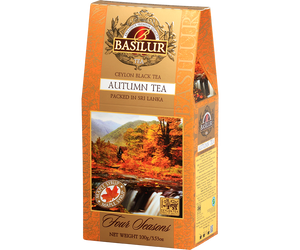Basilur Autumn Tea - czarna herbata cejlońska z dodatkiem krokosza barwierskiego oraz aromatu syropu klonowego. Pomarańczowe pudełko z jesiennym motywem.