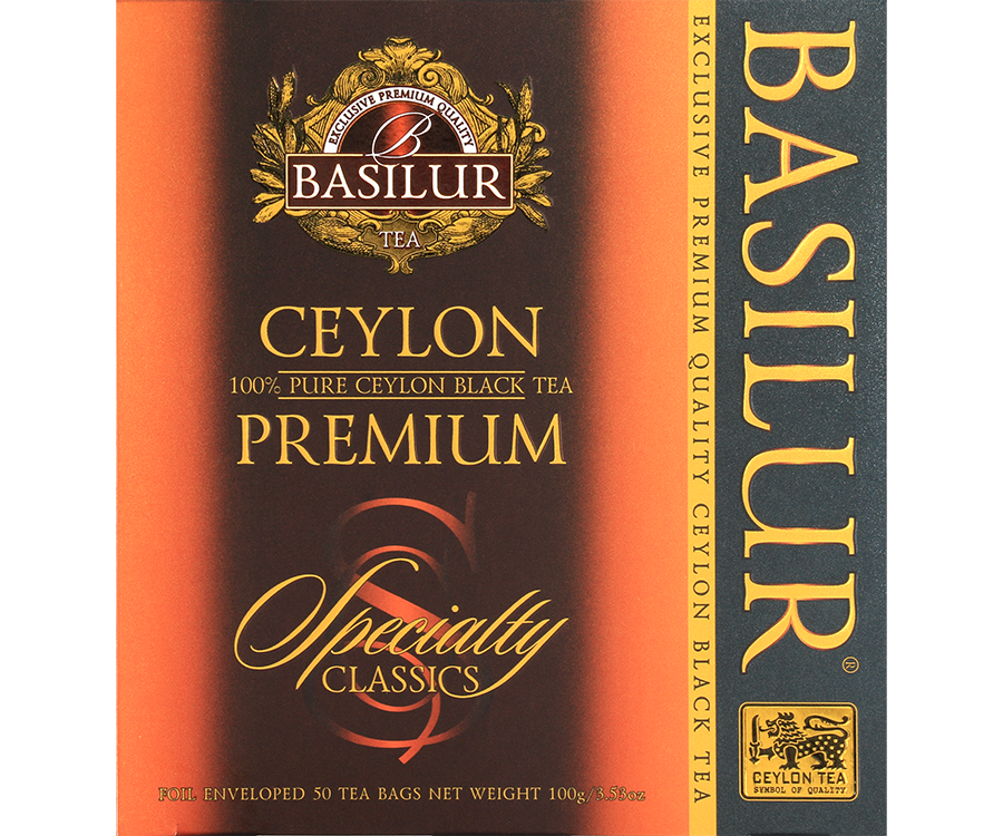 Basilur Ceylon Premium - czarna herbata cejlońska w ozdobnej, pomarańczowej kopercie z logo Basilur.