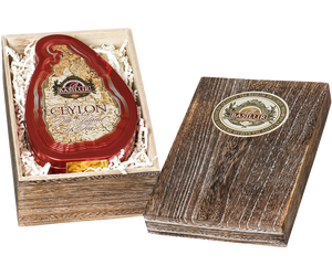 Basilur Crimson Paulownia Box – czarna herbata cejlońska z listków OP1 bez dodatków. Ozdobna puszka i drewniana, kolekcjonerska skrzynka.