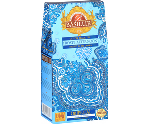 Basilur Frosty Afternoon - czarna herbata cejlońska z dodatkiem chabru oraz naturalnym aromatem marakui i pomarańczy. Niebieskie pudełko z orientalnym motywem.