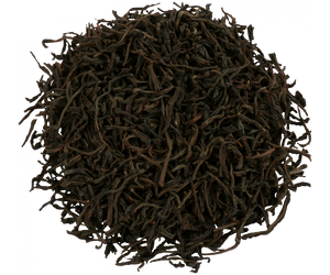Basilur Happy Dragon Year Red – czarna liściasta herbata cejlońska z listków OP zamknięta w zdobionej puszce w kształcie świątecznej bombki z motywem mistycznego smoka otoczonego kwiatami.