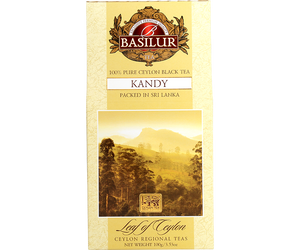 Basilur Kandy - czarna herbata cejlońska bez dodatków, liściasta. Żółte pudełko z górskim pejzażem..