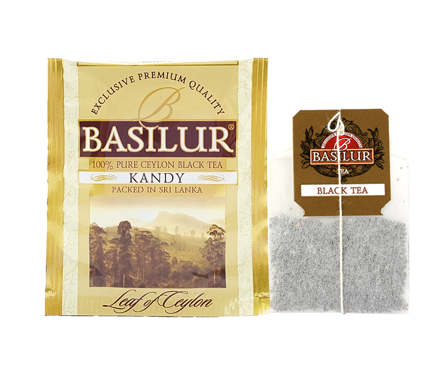 Basilur Kandy - cejlońska herbata czarna ekspresowa bez dodatków. Żółte, ozdobne pudełko ze zdjęciem miasta.
