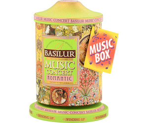 Basilur Music Concert Romantic - zielona herbata cejlońska z dodatkiem ananasa, płatków róży, chabru i nagietka oraz nutą kawy, wanilii i śmietanki. Ozdobna puszka, która w rzeczywistości jest pozytywką wygrywającą melodię.