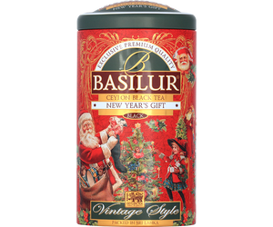 Basilur New Year's Gift - czarna herbata cejlońska z dodatkiem wiśni, krokosza barwierskiego oraz aromatu wiśni i słodkich migdałów. Ozdobna puszka ze świątecznym motywem.