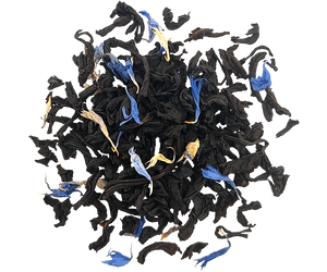 Basilur Shooting Star - czarna liściasta herbata cejlońska z dodatkiem płatków chabru oraz aromatu waty cukrowej. Ozdobna puszka z motywem świątecznym.
