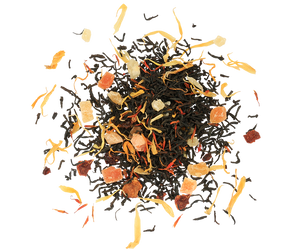 Basilur Tea Book Volume II - czarna herbata cejlońska z dodatkiem papai, nagietka, słonecznika, krokoszu barwierskiego oraz aromatu pomarańczy, cynamonu i wanilii. Zdobiona puszka w kształcie książki. 