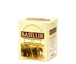 Basilur Uva - cejlońska herbata czarna ekspresowa bez dodatków. Żółte, ozdobne pudełko z motywem słoni.