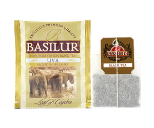 Basilur Uva - cejlońska herbata czarna ekspresowa bez dodatków. Żółte, ozdobne pudełko z motywem słoni.