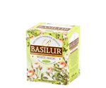 Basilur White Magic - herbata półfermentowana oolong z dodatkiem mlecznego aromatu. Zielone pudełko z botanicznym motywem.