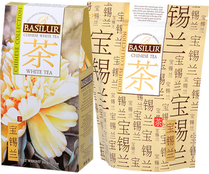 Basilur Chinese White Tea - liściasta biała herbata bez dodatków. Jasne pudełko z botanicznym motywem.