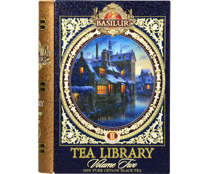 Front opakowania Basilur Tea Library II z obrazem zimowej wioski, złotymi zdobieniami i logo Basilur.