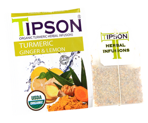 Tipson Turmeric Ginger & Lemon – ziołowa herbata z trawą cytrynową, imbirem, kurkumą, rumiankiem, bazylią i cytryną. Kopertowane saszetki zostały umieszczone w ozdobnym pudełku.